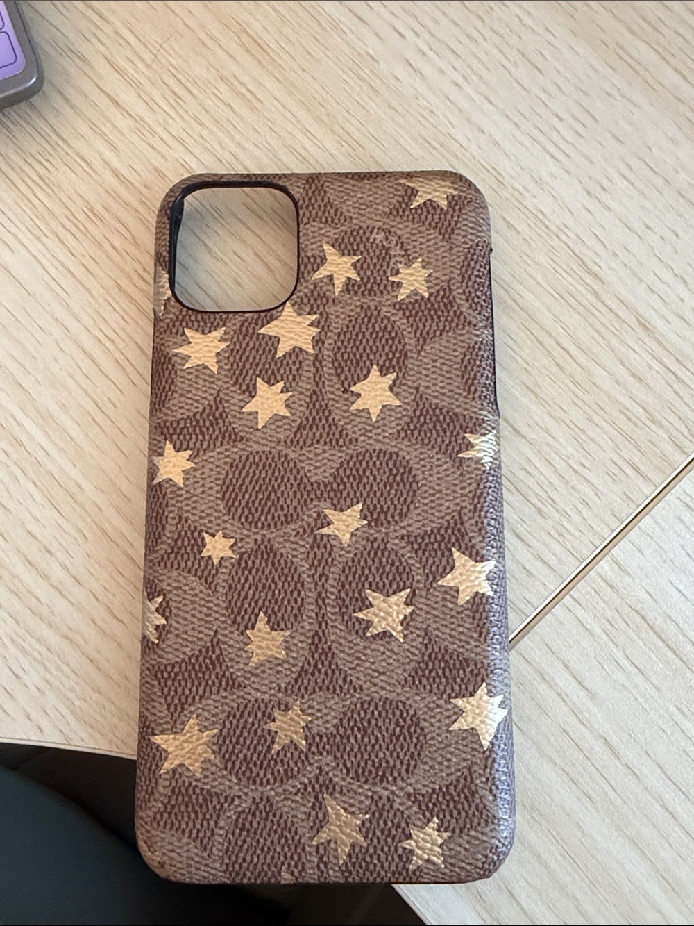 Coach Brown Signature Phone Case with Gold Star Accents
